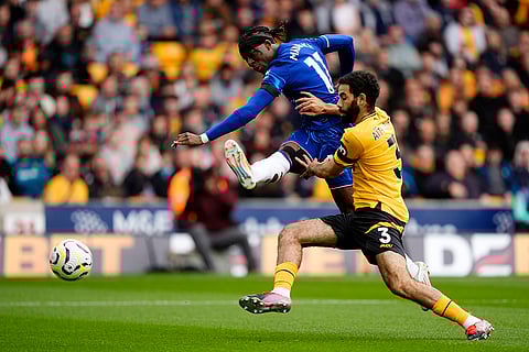 Premier League 2024-25: Chelsea's Noni Madueke, left, and Wolverhampton Wanderers' Rayan Ait-Nouri battle for the ball